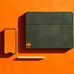 Electronic smart devices mockup. Orange background.